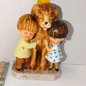 Such a sweet little boy and a little girl with their favorite best friend a dog.